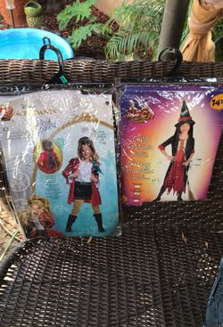 2 medium size girls Halloween costumes