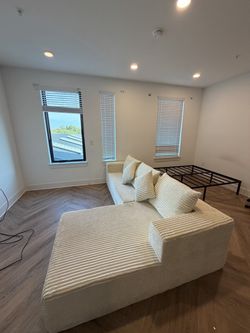 Cream Corduroy Sectional Sofa with Pillows