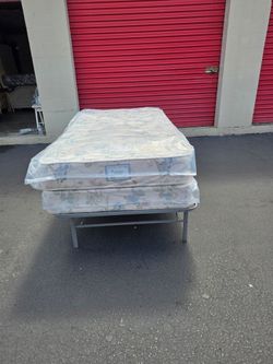 Twin size plush and Box Spring, in plastic