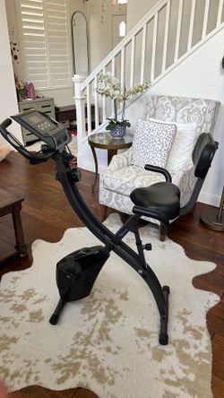 Slim cycle stationary bicycle
