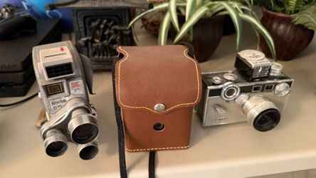 2 vintage cameras one video camera.