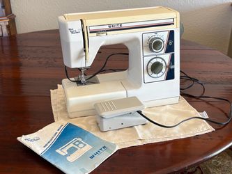 "Blue Jeans Machine" Model 1577 is a classic, highly durable mechanical sewing machine from the 1980s Good