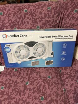 NEW-OPEN BOX- Comfort Zone Twin Window fan with remote control. 