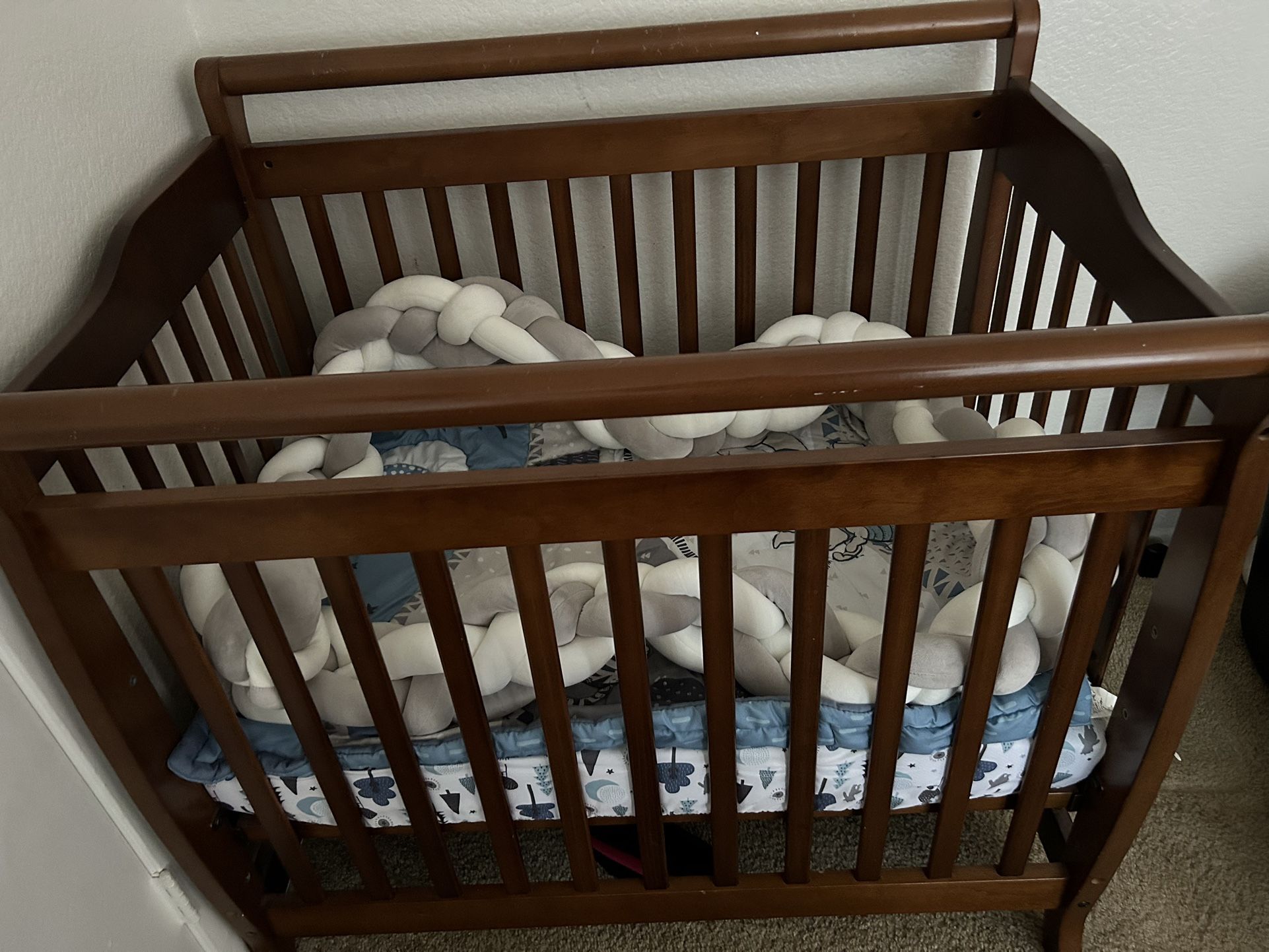 Lightly Used Baby Mini Crib For Sale With Mattress & Sheets