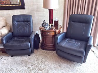 They are SP Dale lll Black Leather Power Wallaway Recliners