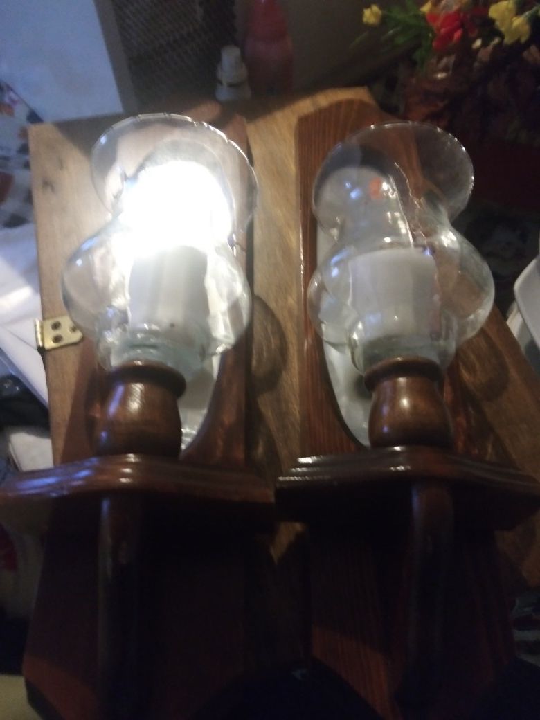 Beautiful set of candle holders with a glass vase to hold the candle in all made of Brownwood asset $10 or best offer