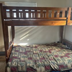 Bunk Bed Twin On Top, Full On Bottom Converts Into Futon Couch. With Futon Comes With Ladder To The Twin. 