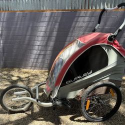 Burley Solo kid trailer plus jogger wheel attachment. 