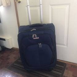 4 Way Rotating Suitcase $30