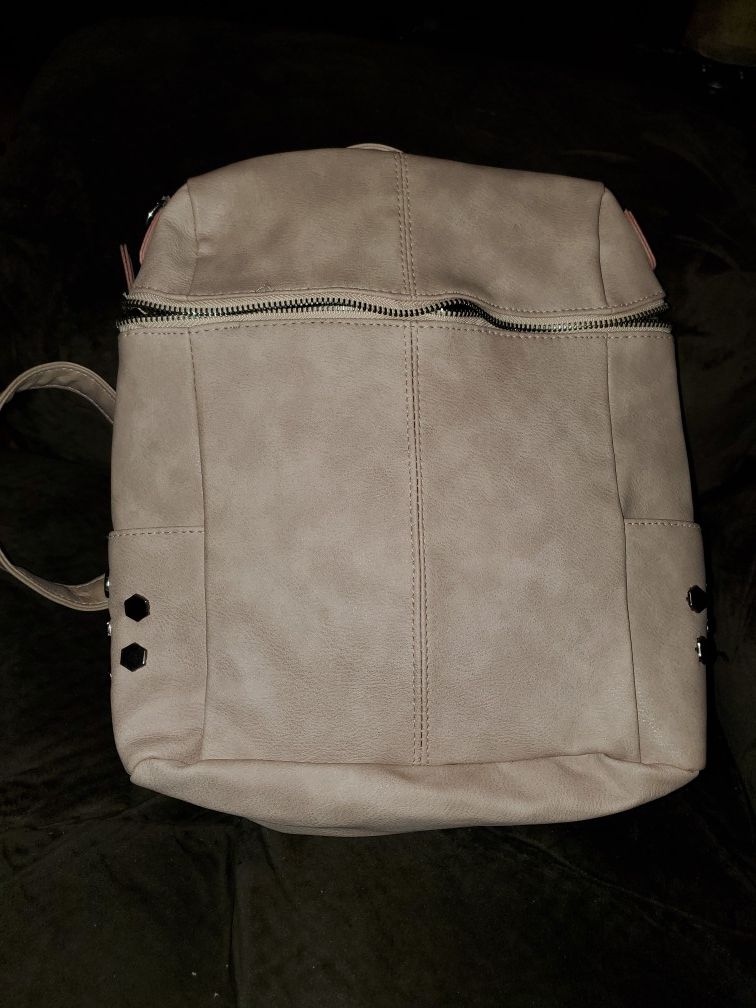 Pale pink backpack style purse