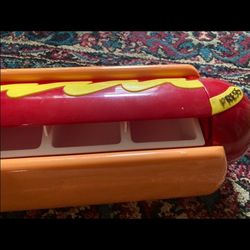Talking hot dog condiments holder