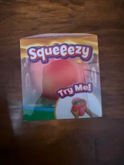 Squeeezy peach sensory toy