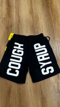 2 Smalls 2 Mediums Alocs shorts with white word design