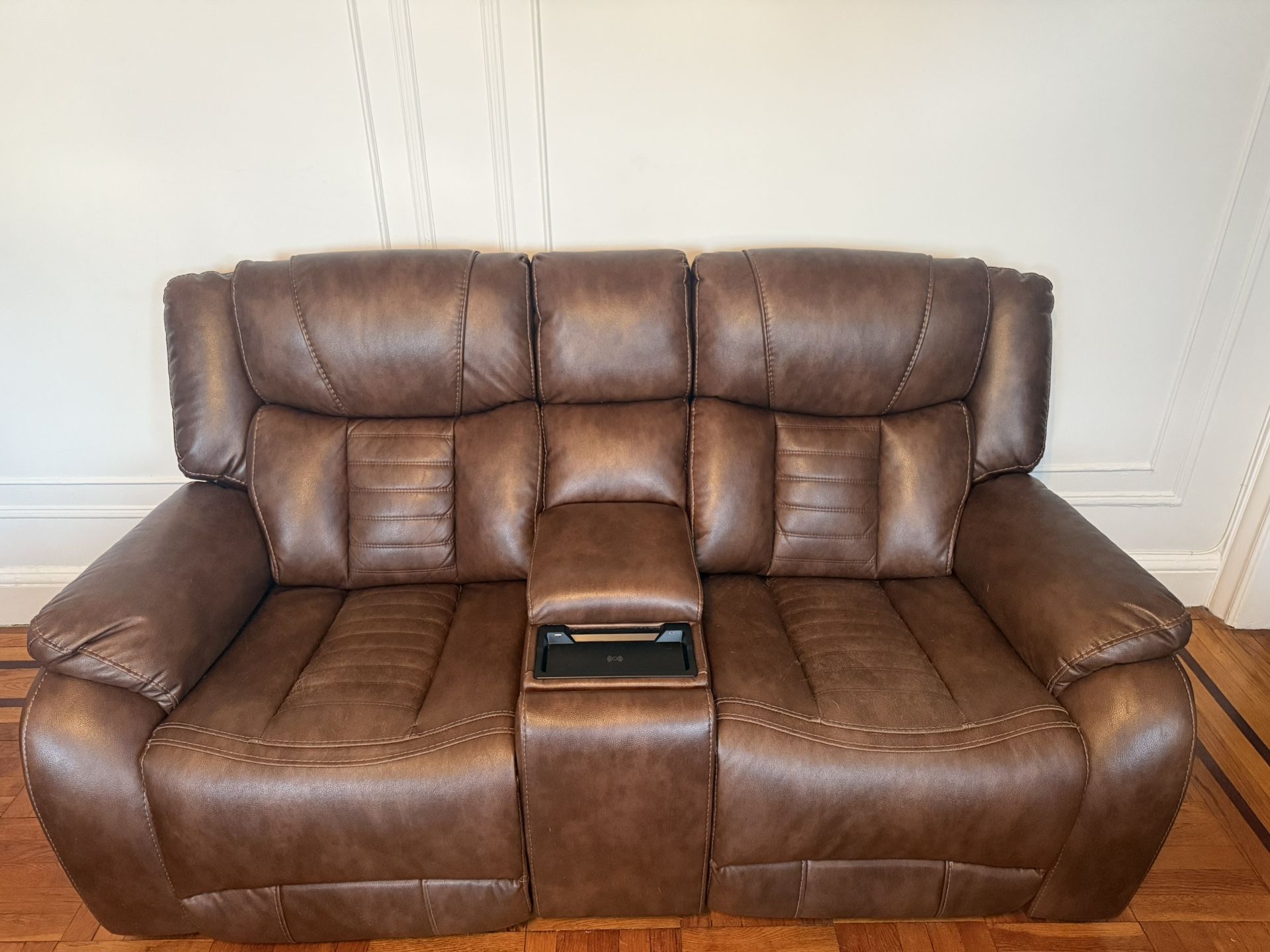 Leather Sofa, loveseat and Recliner It’s a beautiful brown leather cushions set $2500 or BO.