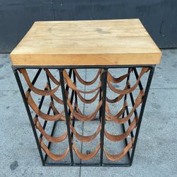 Mid Century Iron and Leather Wine Rack with Butcher Block Top by Arthur Umanoff .