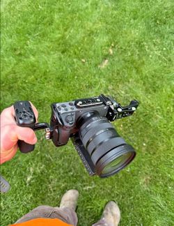Sony FX3 with Sigma 24-70mm f/2.8ii, SmallRig Cage, side handle, and phone holder