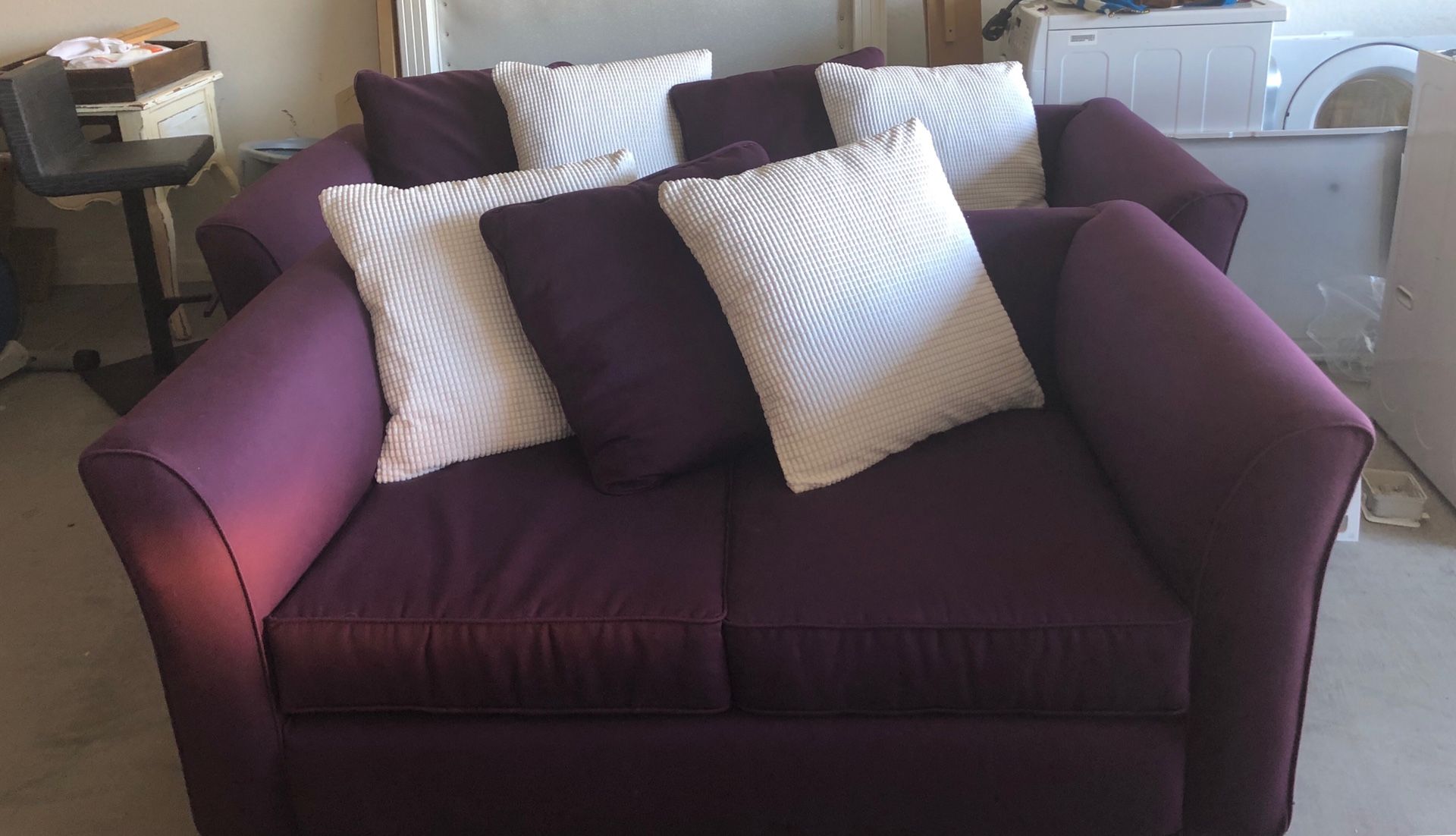 Purple couch and love seat