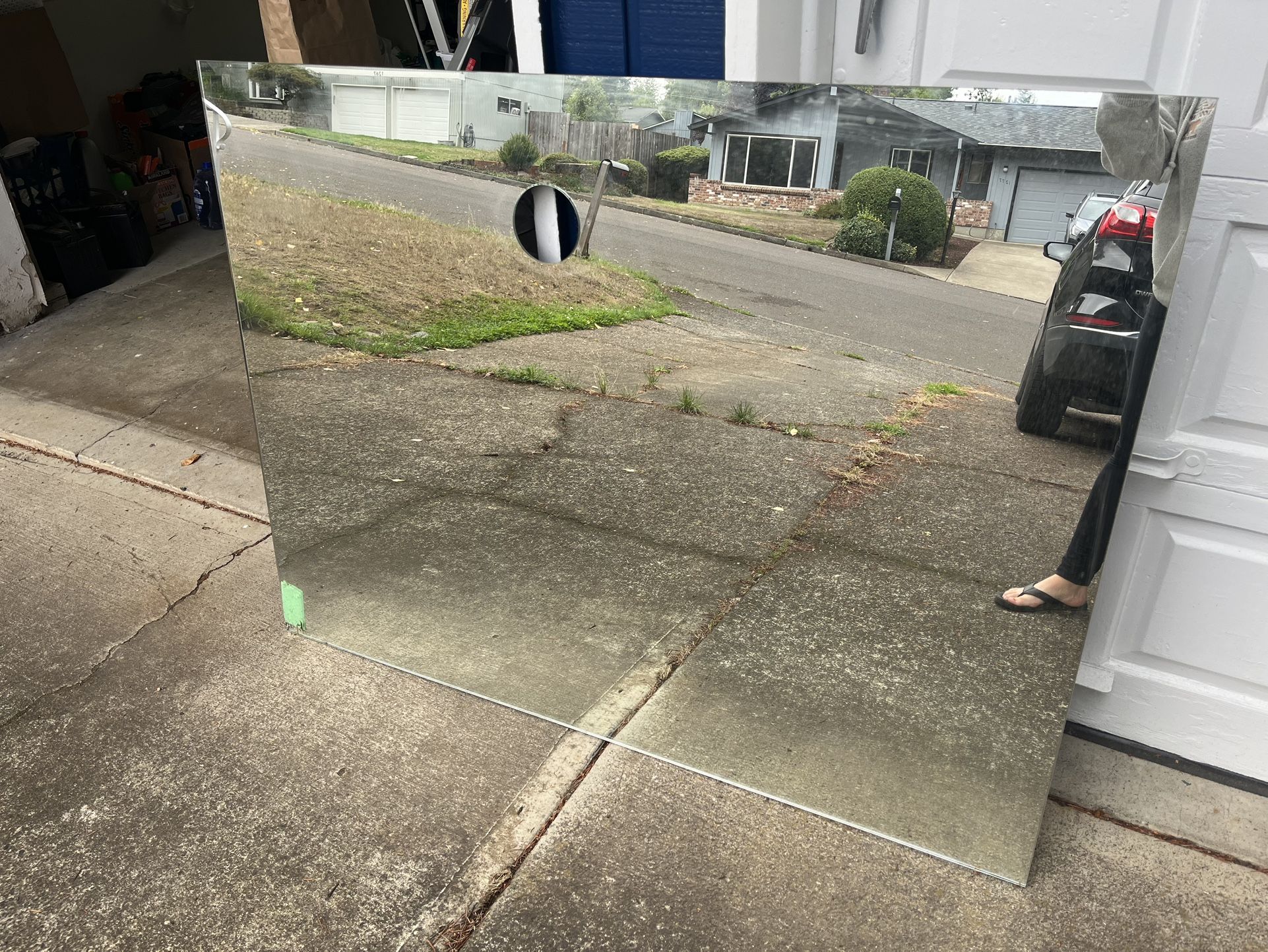 Large mirror with hole for lighting in middle