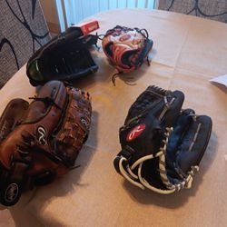 BASEBALL GLOVES ALL ALREADY BROKEN.  DIFERENT SIZES AND PRICES READ EVERYTHING PLS 