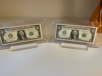 Two consecutive binary numbered dollars
