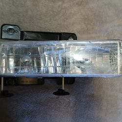 Chevy Suburban Head Light Assembly New And Rear Used Assembly 
