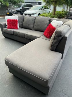 Absolutely perfect condition gray sectional couch !!