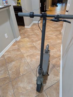 Electric Scooter --32km/h (20mph) top speed, comes with charger.