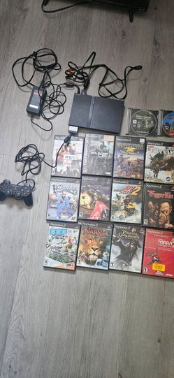 Playstation 2 slim with 14 playable games