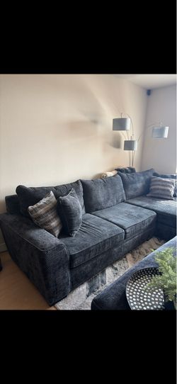 Delano 136" Black Ebony Sectional With Right Arm Facing Oversized Chaise