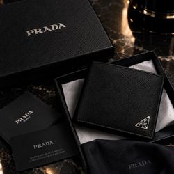 Brand New Prada wallet — never used, in excellent condition.
