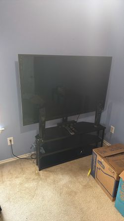 Large Flat Screen TV with Stand