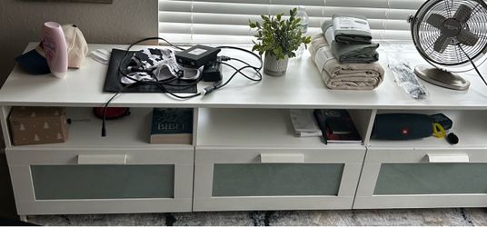 White TV Stand with Drawers and Open Shelves (Small damage on left front leg. Does not affect structure )