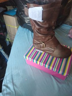 Botas para niña $15