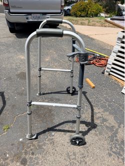 Collapsible walker with wheels