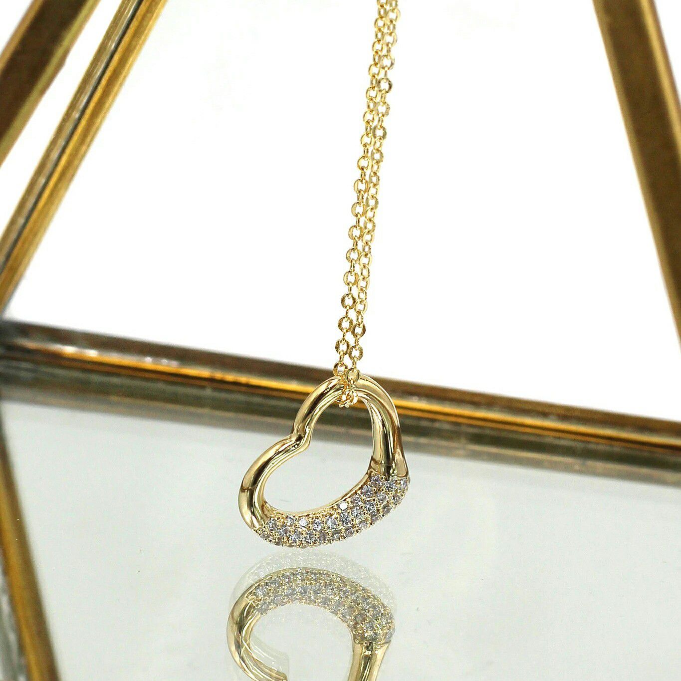 Gold cabinet micro crystal heart necklace