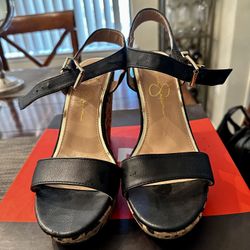 Woman’s Black Wedges Size 7