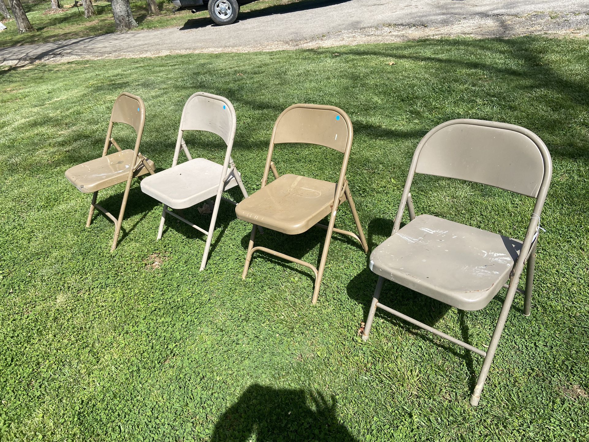 4 Folding Chairs 