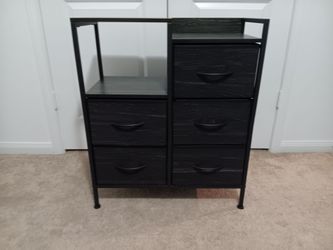 Multi-level dresser with drawers and shelves