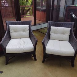 2 Black Rattan Chairs With Cream Leather Cushions