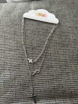 Cross and infinity necklace