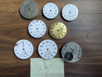 Collection of old antique pocket watch dials and movements from 1800s to early 1900s.  Lot (C).  Likely missing parts, not working. Can be used for cr
