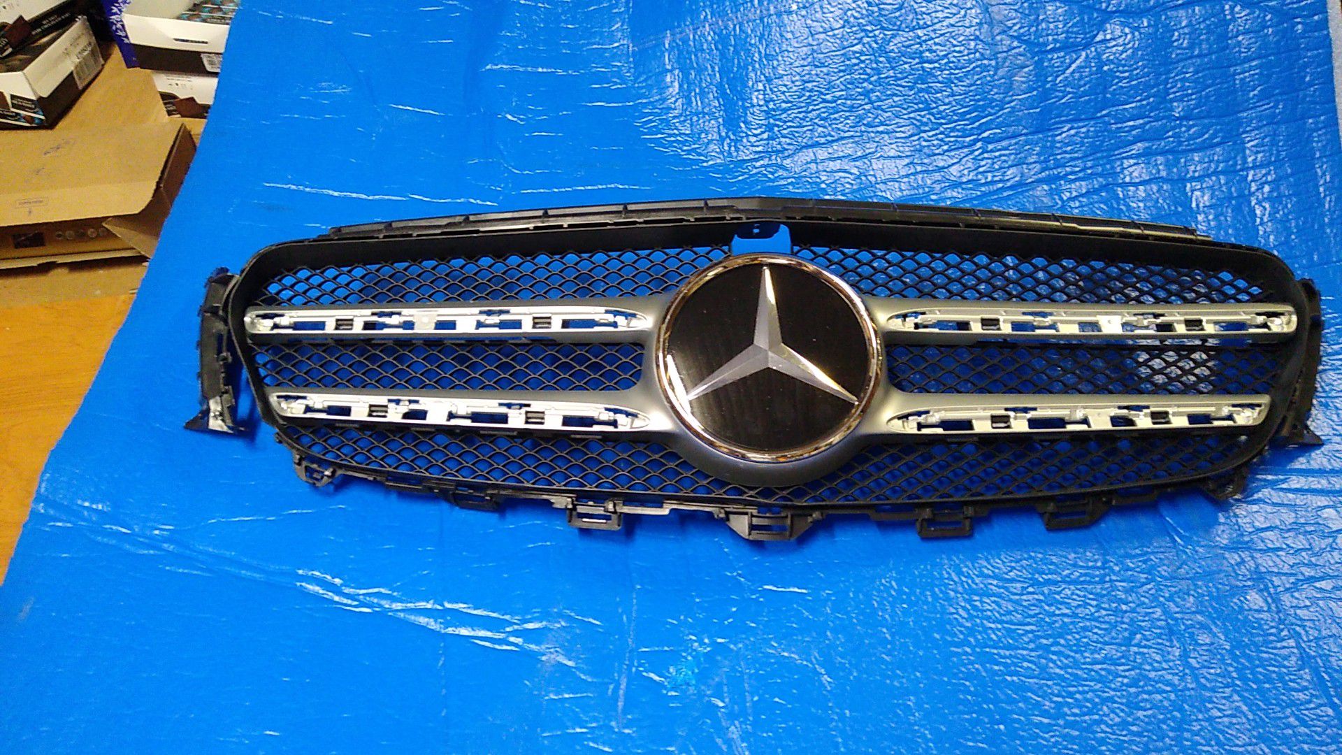 Mercedes Grill @ Emblem provided pictures of part numbers