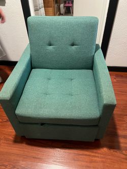 Single chair with ottoman
