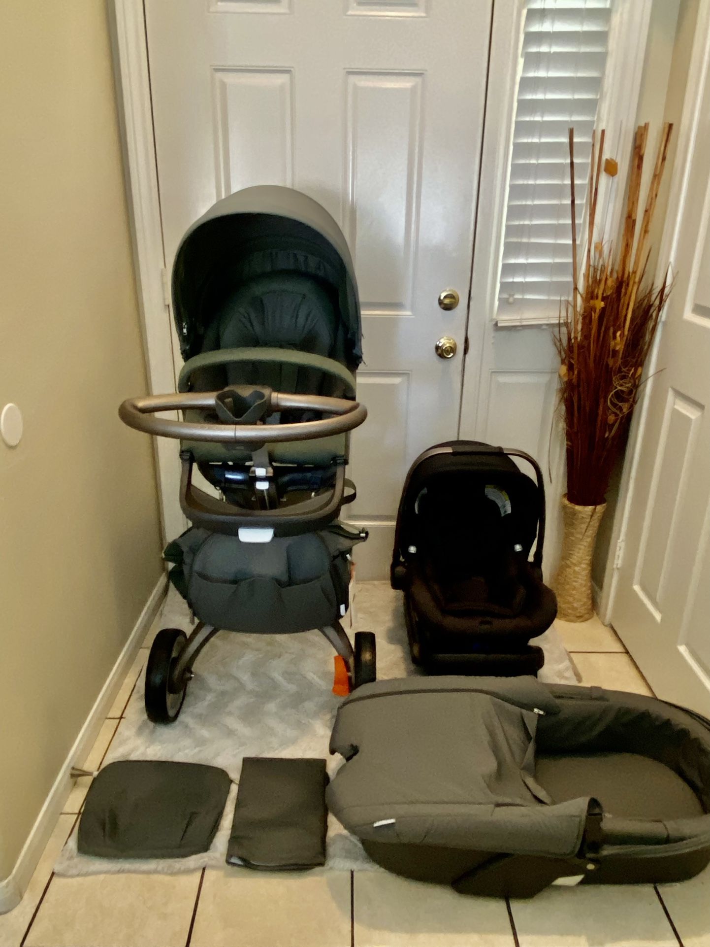 STOKKE XPLORY STROLLER SET WITH BASSINET & CAR SEAT COLOR IS OLIVE GREEN