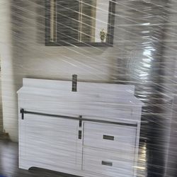 42inch bathroom vanity in white with barn door style, marble top, faucet too