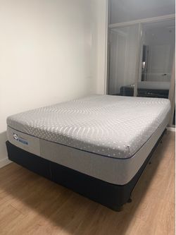 Queen Sealy mattress and bed frame