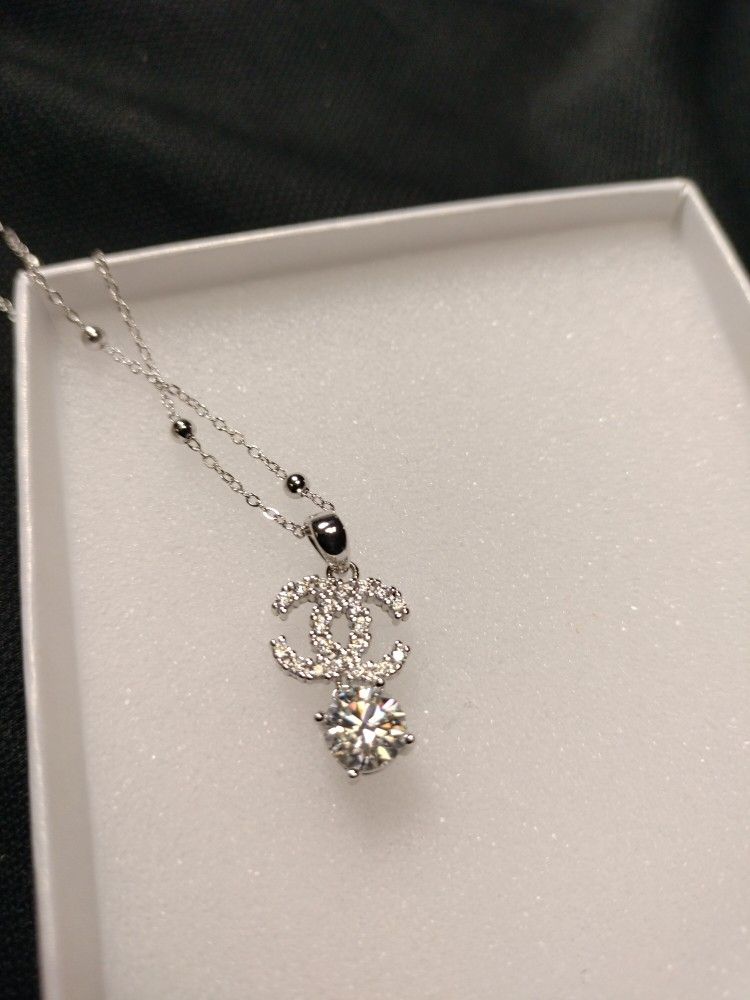 silver CC moissanite necklace
