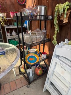 4-tier wire rolling utility storage cart.