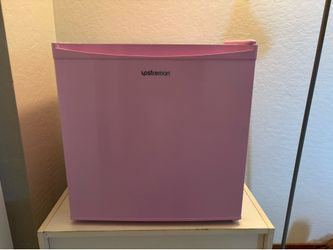 Pink mini fridge