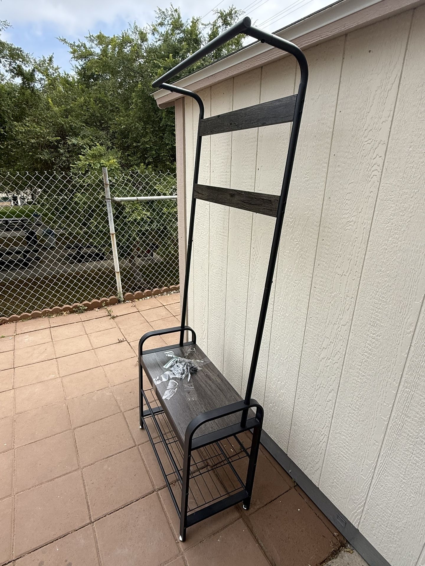 Coat rack with bench and shoe storage for entrance